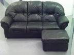 Three Seater Leather Sofa and Footstol Three Seater....
